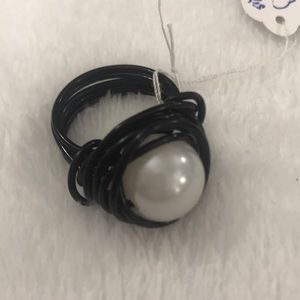 Black wired ring w/ large white bead inside